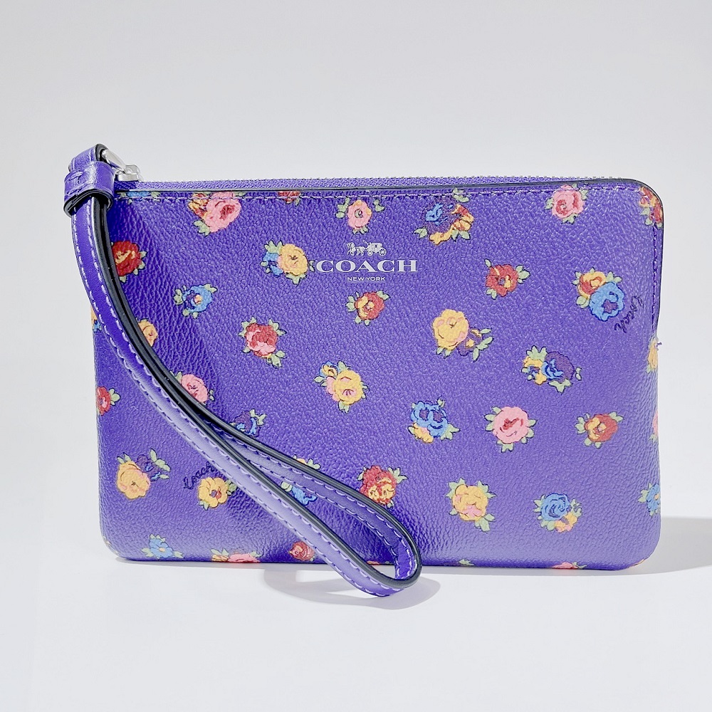 /COACH紫色繽紛花朵PVC材質手拿包